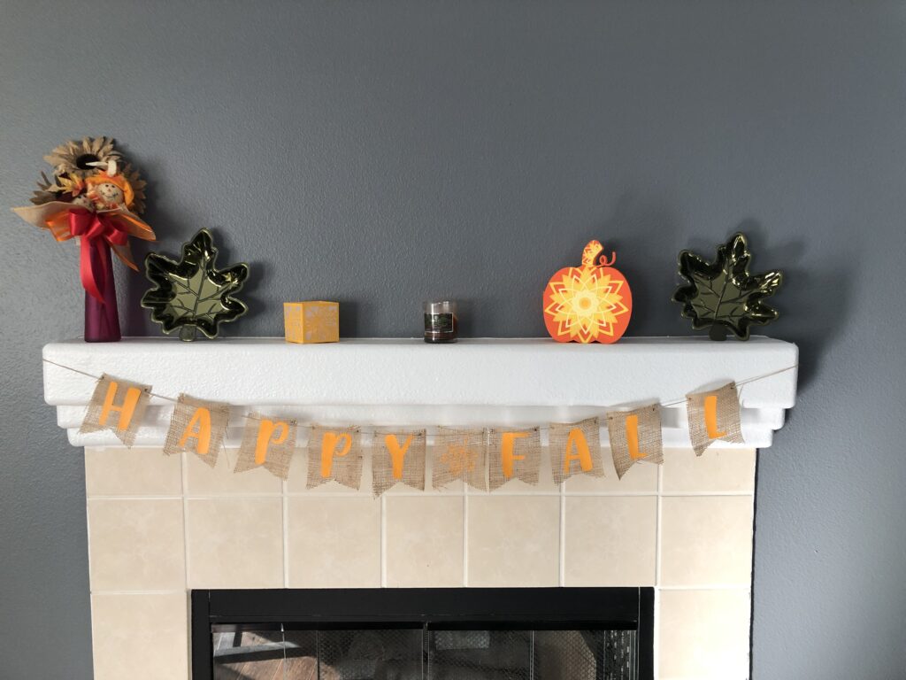 diy burlap banner on display on my mantel