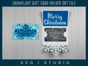 Snowflake gift card holder folds up and opens to reveil a gift card and a "merry christmas" or 'happy holidays'