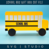 a view of the school bus gift box showing the passenger side with the sliding doors. it says school bus on the side.