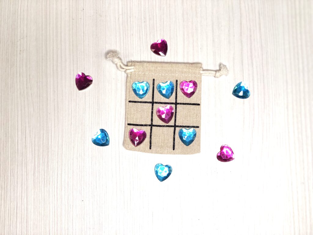 heart shaped gems for tic tac toe bag game.