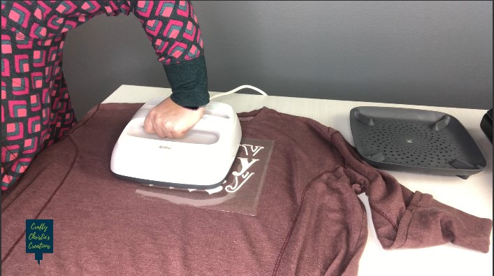 using the easy press to melt the design into the shirt