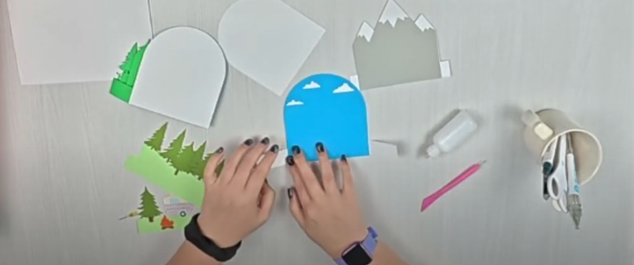 adding the background sky layers to the back card base